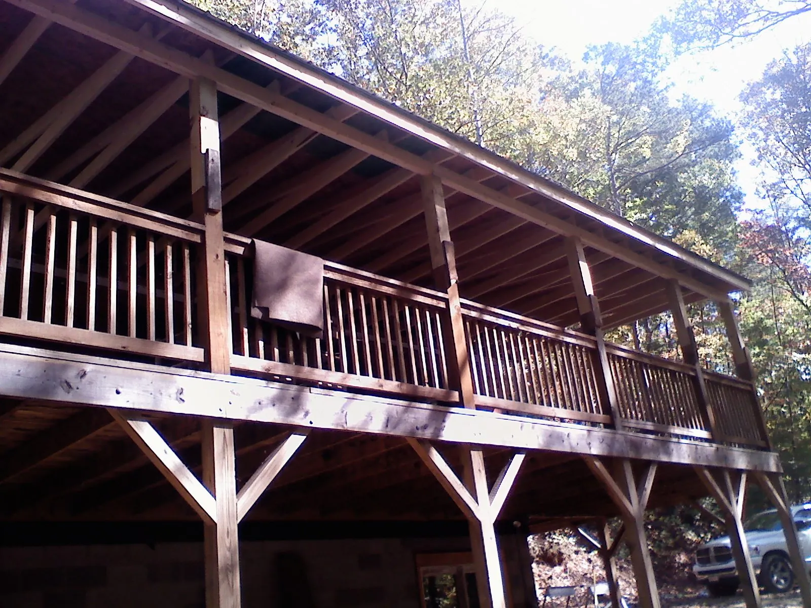Timber framing under a new elevated porch and deck — Roof Leak Repair in Mcconnelsville by Roofing Brothers